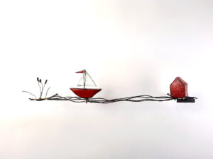 rotes Boot mit Haus
